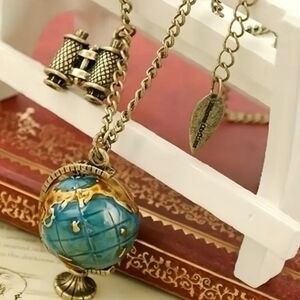 ANTHROPOLOGIE EXPLORER TRAVEL GLOBE NECKLACE